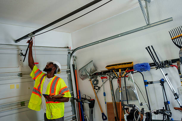 Professional Garage Door Panel Replacement technician working in Camas County County, ID